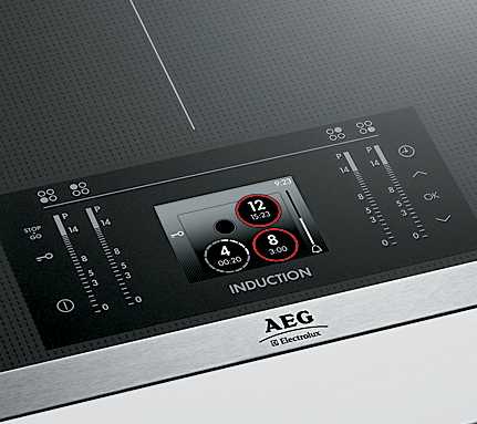 Рейтинг индукционных. AEG Electronic плита индукционная. Индукционная плита AEG С дисплеем. AEG Induction варочная панель с экраном. Индукционная плита с экраном.